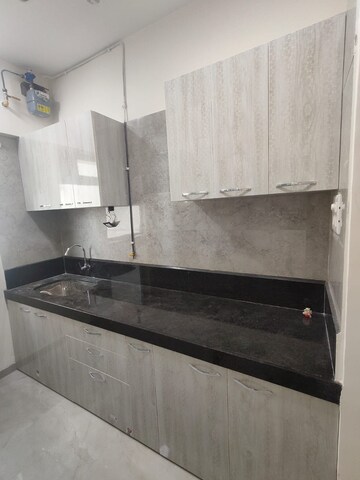 Kitchen in 2 BHK Apartment at Sheth Irene, Malad West – for Rent