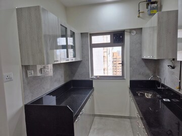 Kitchen in 1 BHK Apartment at Sheth Irene, Malad West – for Sale