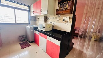 Kitchen in 2 BHK Apartment at Matoshree Pride, Parel – for Rent