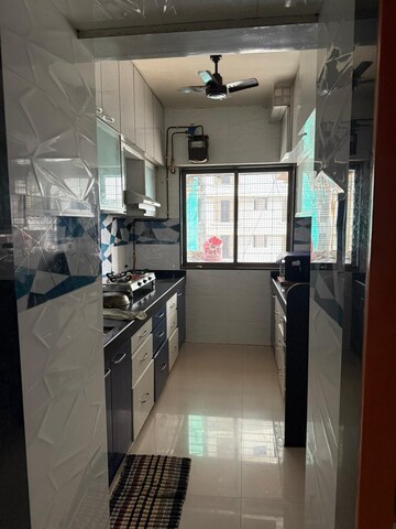 Kitchen in 2 BHK Apartment at Anmol CHS Borivalli, Borivali West – for Rent