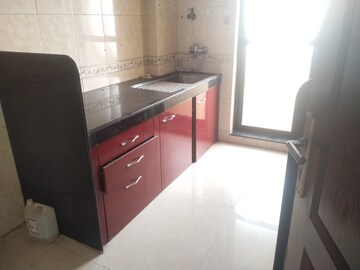 Kitchen in 2 BHK Apartment at Raheja Interface Heights, Malad West – for Rent