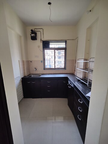 Kitchen in 1 BHK Apartment at Vihang Golden Hills, Owale – for Rent