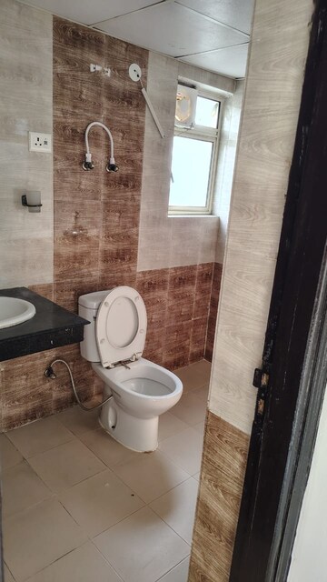 Bathroom in 2 BHK Apartment at Nimbus The Hyde park, Sector 78 – for Sale