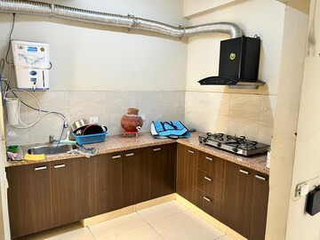Kitchen in 1 BHK Apartment at Urban Homes 21, Niti Khand – for Sale