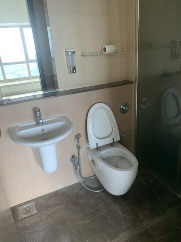 Bathroom in 4 BHK Apartment at Omkar Alta Monte, Malad East – for Rent