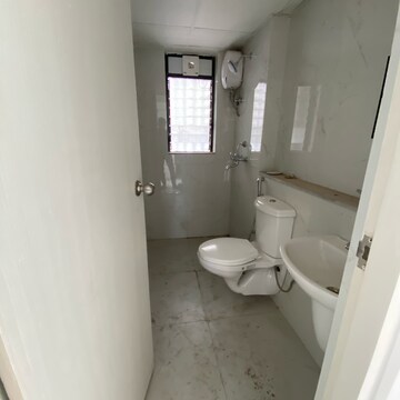 Bathroom in 3 BHK Apartment at Runwal Gardens Phase 2, Kalyan Shilphata Road – for Rent