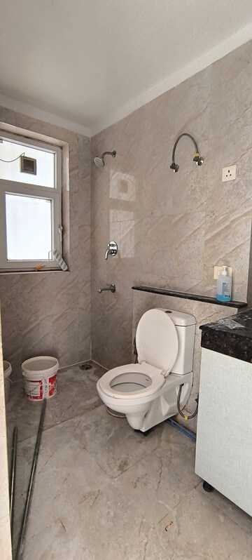 Bathroom in 3 BHK Apartment at Adani Oyster Grande Phase 2, Sector 102 – for Rent