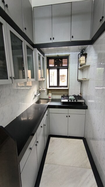 Kitchen in 1.5 BHK Apartment at Adarsh Nagar CHS Worli, Worli – for Rent