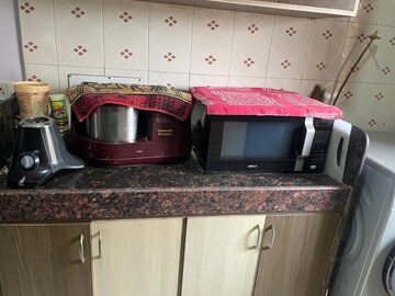 Kitchen in 2 BHK Apartment at Riddhi Garden, Malad East – for Rent