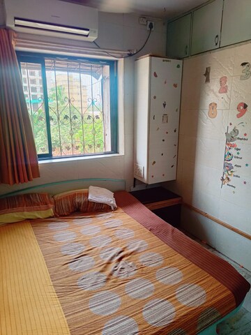Bedroom in 3 BHK Apartment at Sanghvi Suri Rajendra Tower, Jogeshwari East – for Sale