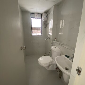Bathroom in 1 BHK Apartment at Runwal Gardens Phase 2, Kalyan Shilphata Road – for Rent