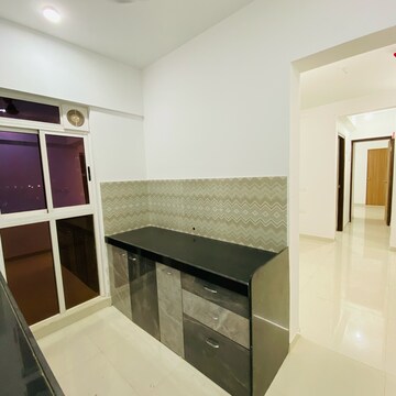 Kitchen in 1 BHK Apartment at Lodha Codename Premier, Mangaon – for Rent