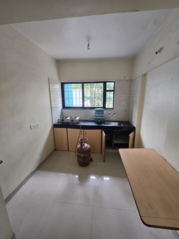 Kitchen in 2 BHK Apartment at Parulekar Shilpashree, Kothrud – for Rent