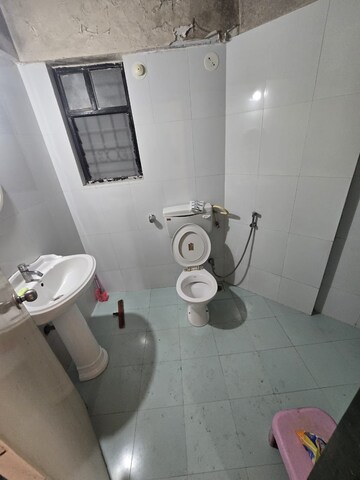 Bathroom in 2 BHK Apartment at Parulekar Shilpashree, Kothrud – for Rent