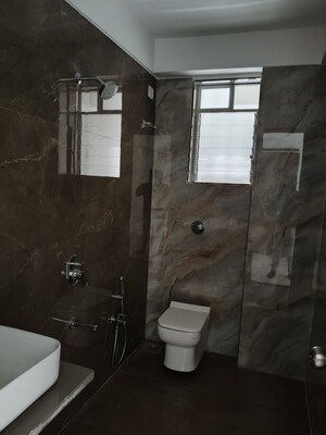 Bathroom in 3 BHK Apartment at Dura Giriraj Sparsh, Naupada – for Sale