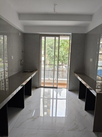 Kitchen in 3 BHK Apartment at Dura Giriraj Sparsh, Naupada – for Sale