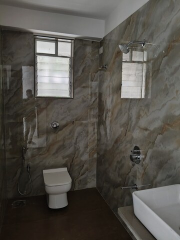 Bathroom in 3 BHK Apartment at Dura Giriraj Sparsh, Naupada – for Sale
