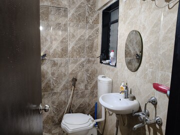 Bathroom in 1 BHK Apartment at Haware Dahlia, Kasarvadavali – for Sale