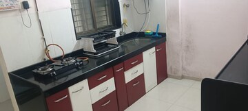Kitchen in 2 BHK Apartment at Shree Satya Shankar Residency, Manpada – for Rent