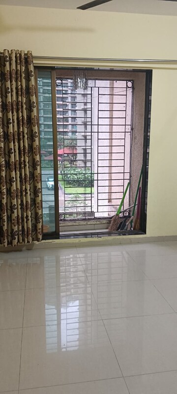 Living Room in 2 BHK Apartment at Shree Satya Shankar Residency, Manpada – for Rent