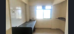 Kitchen in 1 BHK Apartment at Unique Greens Ghodbunder Road, Ghodbunder Road – for Sale