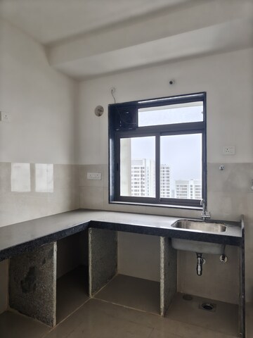 Kitchen in 1 BHK Apartment at Runwal Eirene, Balkum Pada – for Sale