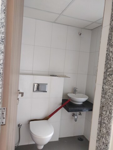 Bathroom in 1 BHK Apartment at Godrej Nirvaan, Themghar – for Rent