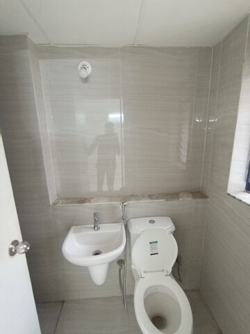 Bathroom in 3 BHK Apartment at Runwal Gardens Phase I, Dombivli East – for Rent