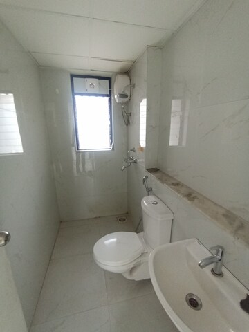 Bathroom in 3 BHK Apartment at Runwal Gardens Phase I, Dombivli East – for Rent