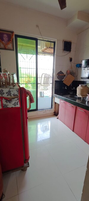 Kitchen in 1 BHK Apartment at Shree Satyam Paradise, Badlapur West – for Sale