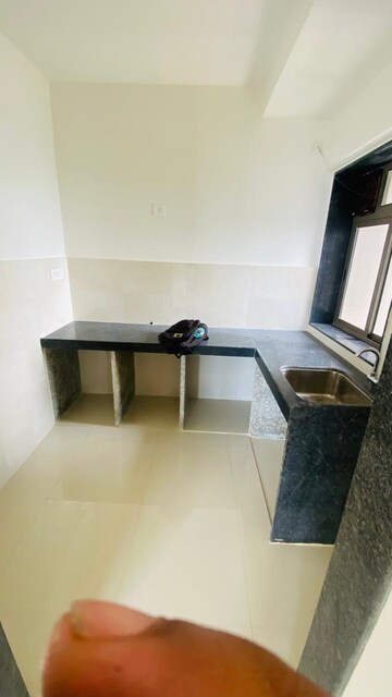 Kitchen in 2 BHK Apartment at Raymond Ten X Habitat, Pokhran Road No Two – for Rent
