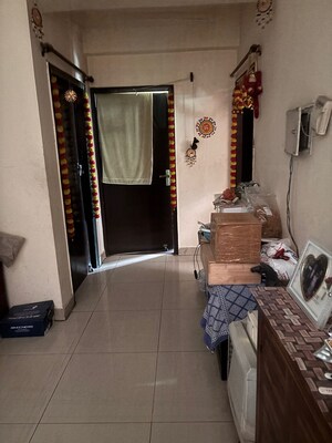 Living Room in 2 BHK Apartment at Amrapali Empire, Sain Vihar – for Sale