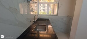 Kitchen in 2 BHK Apartment at Rustomjee Azziano Wing D, Thane West – for Sale