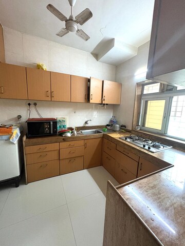 Kitchen in 2 BHK Apartment at Parag Mansion Chs , Andheri West – for Rent