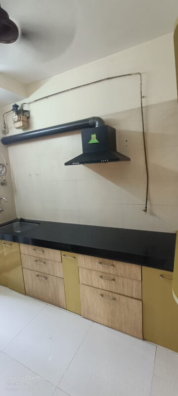 Kitchen in 3 BHK Apartment at Om Heights Dadar, Dadar West – for Rent