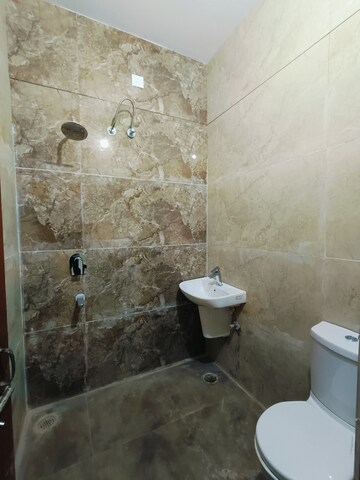 Bathroom in 3 BHK Apartment at Sunny Enclave – for Rent