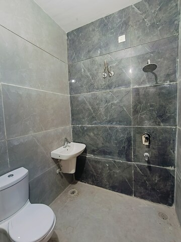 Bathroom in 3 BHK Apartment at Sunny Enclave – for Rent