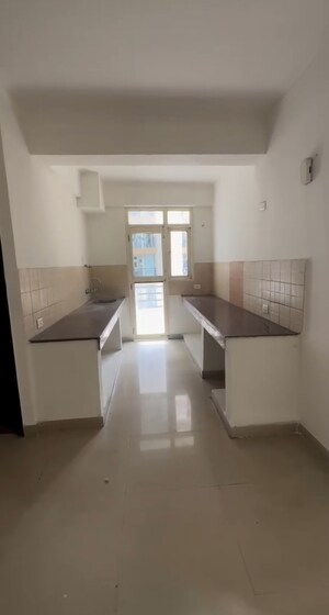 Kitchen in 3 BHK Apartment at Bulland Heights, Sain Vihar – for Sale