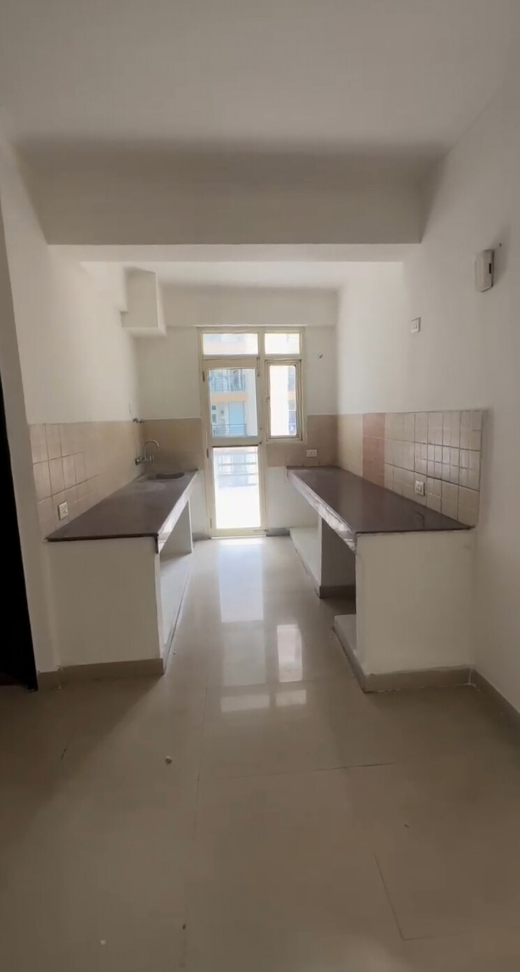 Kitchen, bulland-heights 3 Bedroom 1685 Sq.Ft. Apartment In Sain Vihar Ghaziabad 8786549