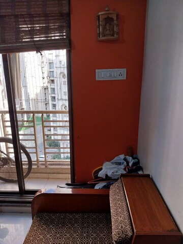 Living Room in 1 BHK Apartment at Prakruti Pearl, Ghodbunder Road – for Sale