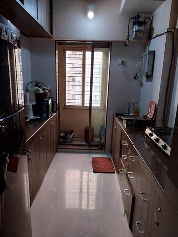 Kitchen in 1 BHK Apartment at Prakruti Pearl, Ghodbunder Road – for Sale
