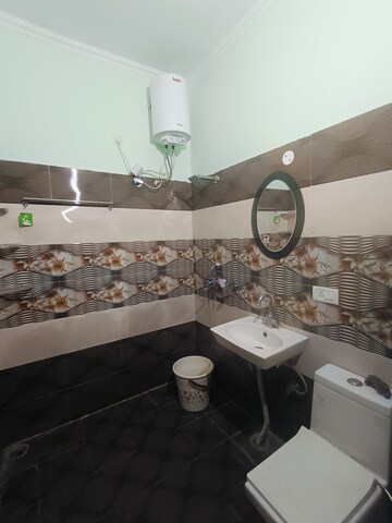 Bathroom in 2 BHK Apartment at Sunny Enclave – for Rent