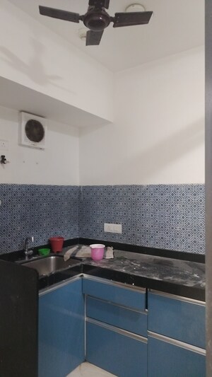 Kitchen in 1 BHK Apartment at Lodha Crown Quality Homes, Majiwada – for Sale