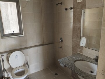 Bathroom in 3 BHK Apartment at Unitech Uniworld Gardens 2, Sector 47 – for Rent