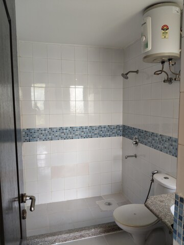 Bathroom in 3 BHK Apartment at Unitech Uniworld Gardens 2, Sector 47 – for Rent