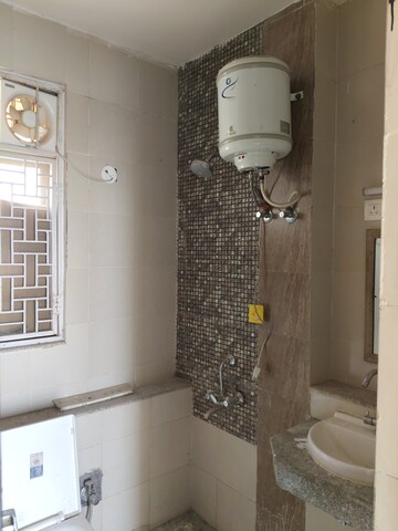 Bathroom in 2 BHK Apartment at Unitech Uniworld Gardens 2, Sector 47 – for Rent