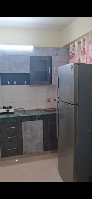 Kitchen in 1 BHK Apartment at ROF Aalayas, Sector 102 – for Sale