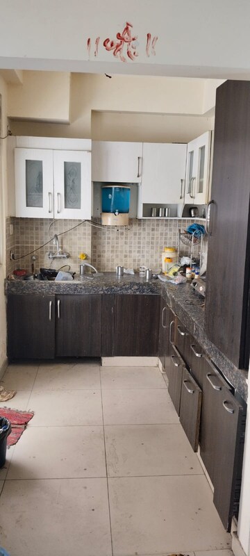Kitchen in 2 BHK Apartment at Mahagun Mascot Phase V, Dundahera – for Rent