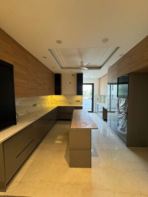 Kitchen in 4 BHK Builder Floor at Ansal Sushant Lok I, Sector 43 – for Sale