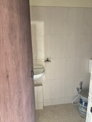 Bathroom in 2 BHK Apartment at Pushpanjali Heights, Owale – for Rent